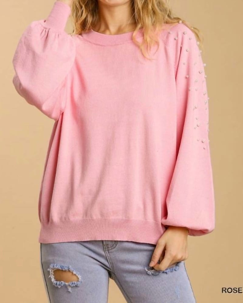 Front of a model wearing a size Large Round Neck Pullover Sweater in Rose in Rose by Umgee. | dia_product_style_image_id:326303